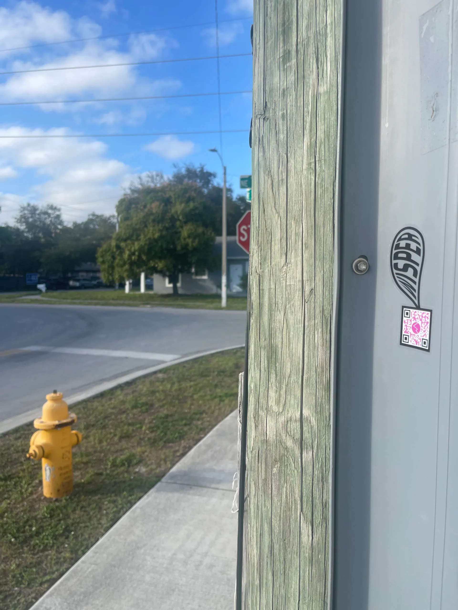 Wisper sticker on a bus stop