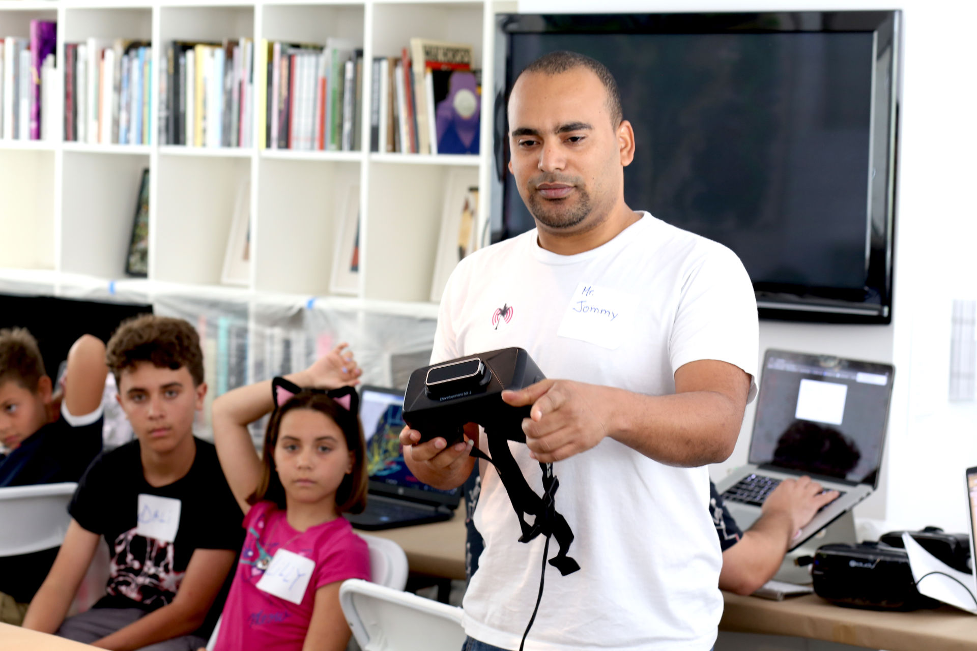 A man holding an oculus on a XRCamp workshop